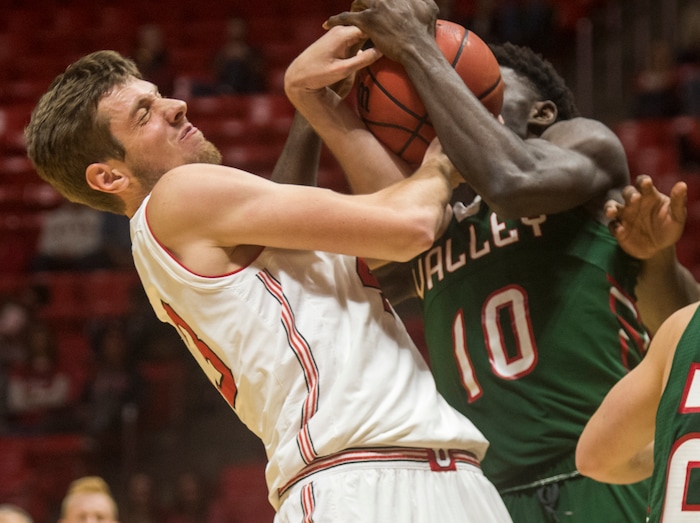 (Rick Egan  |  The Salt Lake Tribune)  Utah Utes forward Jakub Jokl (43) and Mississippi Valley State Delta Devils center Emmanuel Ejeh (10) battle for possession of the ball, in basketball action Utah Utes vs. Mississippi Valley State Delta Devils, at the Jon M. Huntsman Center,  Monday, November 13, 2017.