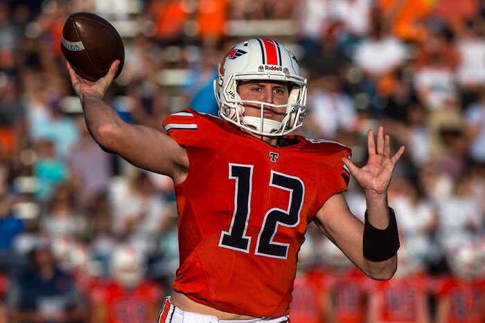 (Chris Detrick  |  The Salt Lake Tribune)  Timpview's Isiah Ramos (12) passes the ball during the game at Timpview High School Thursday, August 17, 2017. 