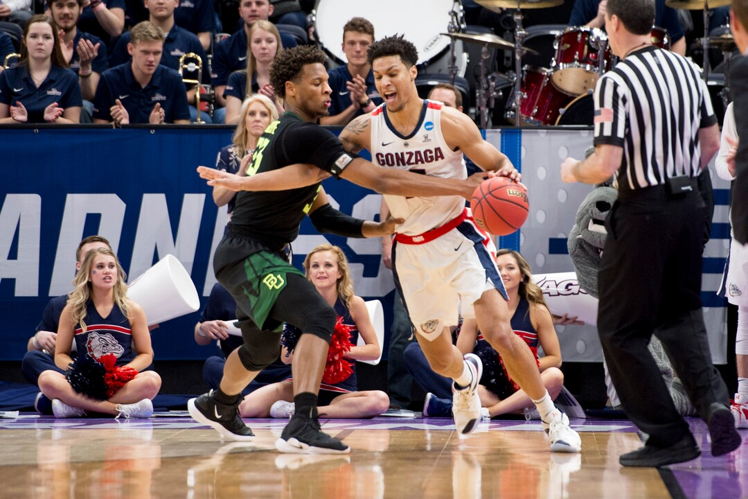 (Leah Hogsten  | The Salt Lake Tribune)  Baylor Bears forward Freddie Gillespie (33) tries to get the ball away from Gonzaga Bulldogs forward Brandon Clarke (15) as Baylor faces Gonzaga in the second round of the NCAA tournament in Salt Lake City on Saturday, March 23, 2019.