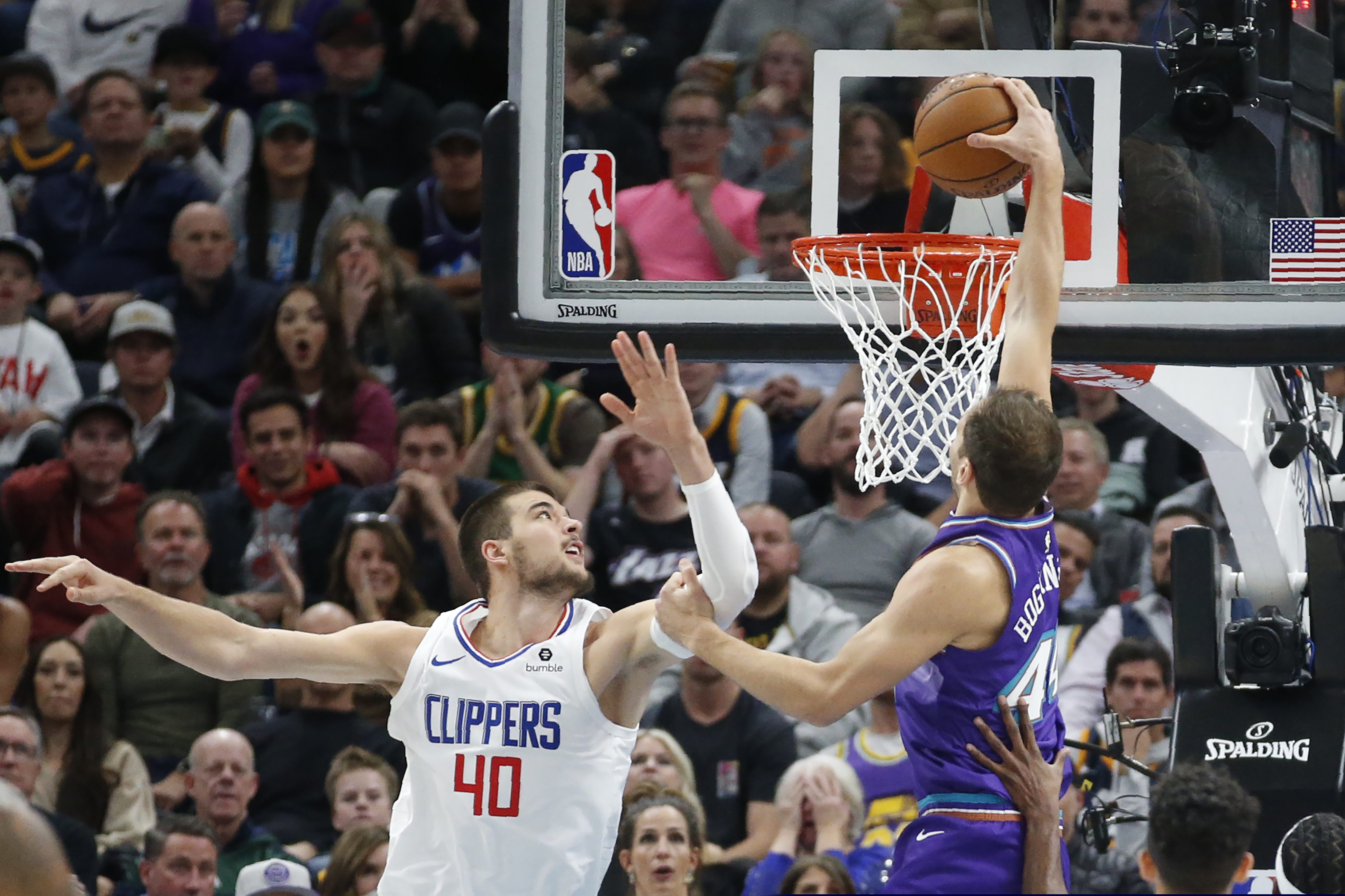 (Rick Bowmer | AP)  Utah Jazz forward Bojan Bogdanovic (44) dunks next to Los Angeles Clippers center Ivica Zubac (40) during the first half of an NBA basketball game Wednesday, Oct. 30, 2019, in Salt Lake City.