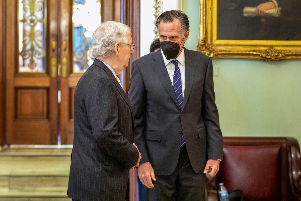 (Amanda Andrade-Rhoades | AP) Senate Minority Leader Mitch McConnell, R-Ky., left, speaks to Sen. Mitt Romney, R-Utah, at the Capitol in Washington, Thursday, Jan. 13, 2022.