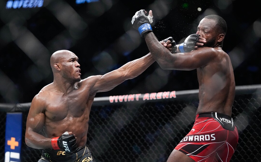 (Francisco Kjolseth | The Salt Lake Tribune) Nigerian UFC fighter Kamaru Usman, left, fights with UFC fighter Leon Edwards, of Jamaica, during the welterweight UFC 249 mixed martial arts title bout in Salt Lake City on Saturday, Aug. 20, 2022, before being knocked out by Edwards. Usman was knocked out in the fifth round relinquishing his title as welterweight champion of the world. 