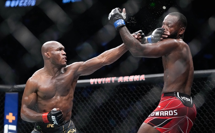 (Francisco Kjolseth | The Salt Lake Tribune) Nigerian UFC fighter Kamaru Usman, left, fights with UFC fighter Leon Edwards, of Jamaica, during the welterweight UFC 249 mixed martial arts title bout in Salt Lake City on Saturday, Aug. 20, 2022, before being knocked out by Edwards. Usman was knocked out in the fifth round relinquishing his title as welterweight champion of the world. 