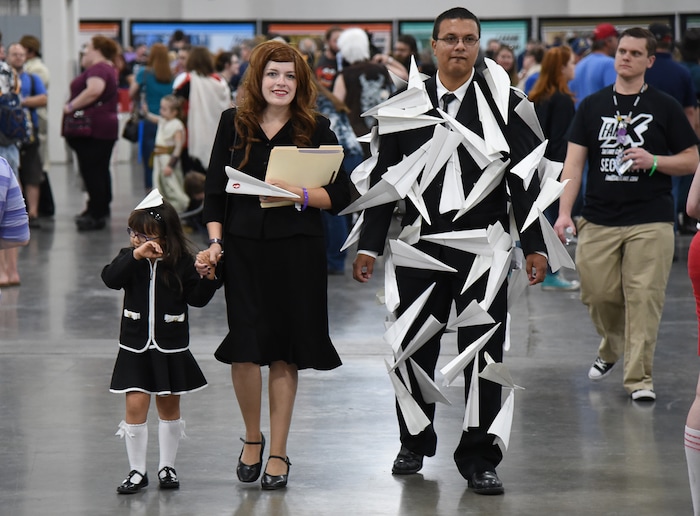 (Francisco Kjolseth  |  The Salt Lake Tribune)  Eponine Winston, 4, and her parents Kathryn and Levi of Tacoma, Wash., as characters from the Pixar short The Paper Man attend the start of FanX Salt Lake Comic Convention at the Salt Palace in Salt Lake City Thursday, Sept. 6, 2018, during the three-day pop culture convention.