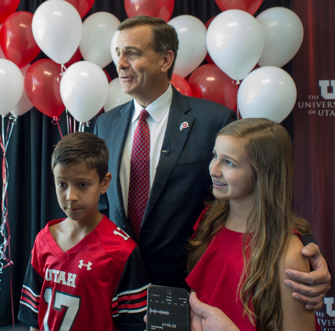(Rick Egan  |  The Salt Lake Tribune)   University of Utah Athletic Director, Mark Harlan, is interviewed with his children, Austin, 10 and Savanah 13, during a news conference at the Rice-Eccles Stadium,  Monday, June 4, 2018.