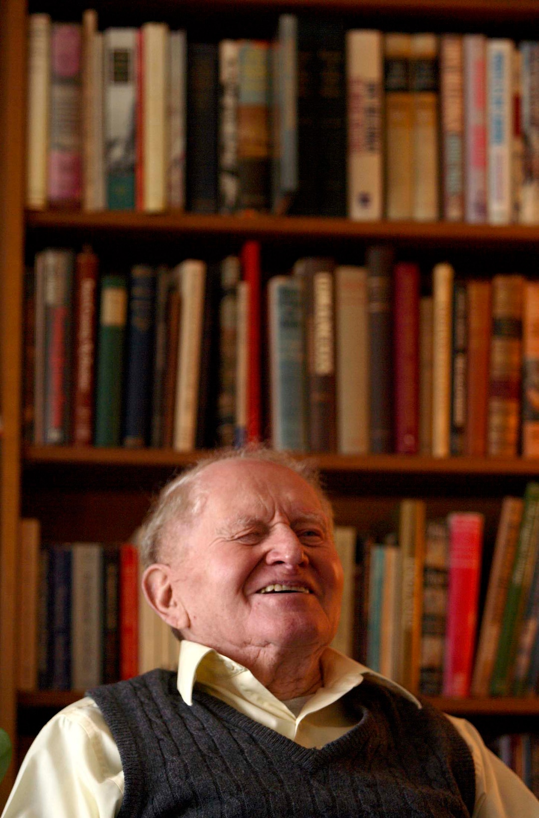(Trent Nelson | Tribune file photo) Sam Weller, who ran Sam Weller's Bookstore for years, talks in his home in the Avenues and surrounded by books on March 23, 2006.
