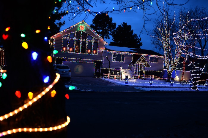 (Scott Sommerdorf | The Salt Lake Tribune)
A view of some of the houses on Royalwood Drive in Taylorsville, Friday, December 22, 2017. "Christmas Street" is a Taylorsville neighborhood where residents up and down the street decorate their homes every year with Christmas lights. The United States uses more electricity for Christmas lights than some countries use all year.