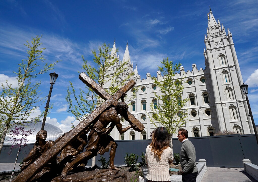 (Chris Samuels | The Salt Lake Tribune) Visitors observe a new statue of Jesus Christ at the visitors’ center at Temple Square in Salt Lake City, Monday, April 13, 2026.