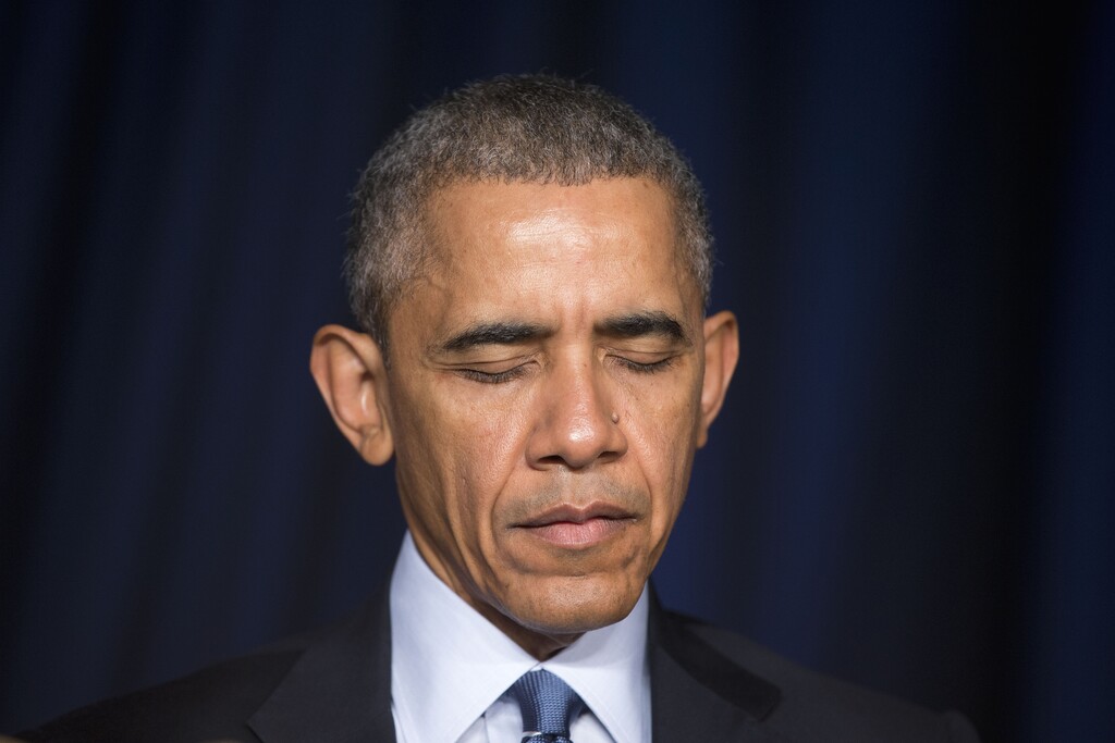 (Pablo Martinez Monsivais | AP file photo) President Barack Obama closes his eyes while a prayer is said during the National Prayer Breakfast in Washington, Thursday, Feb. 4, 2016.