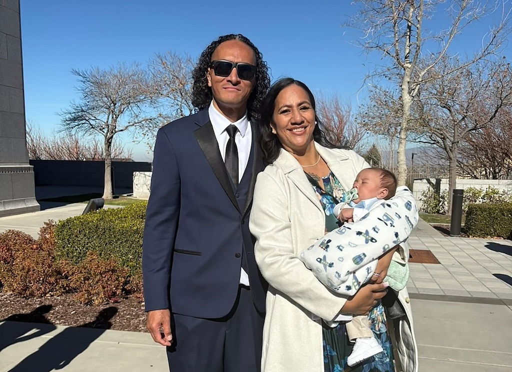 (Tulikihihifo family) Pictured is Vaea “Junior" Tulikihihifo, 46, with his youngest son and his wife, Nani. Tulikihihifo was fatally shot Wednesday, Jan. 7, 2026 outside of a Salt Lake City church.