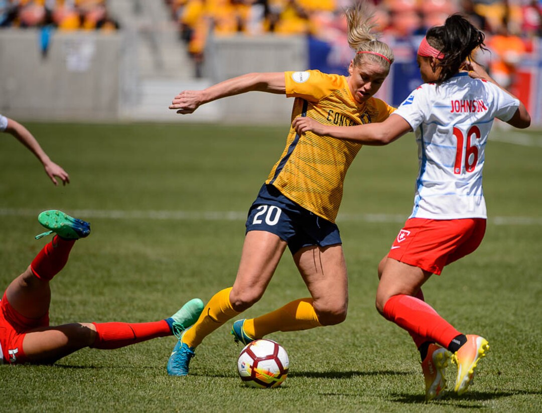 (Trent Nelson | The Salt Lake Tribune)  Utah Royals FC hosts the Chicago Red Stars, at Rio Tinto Stadium in Sandy, Saturday April 14, 2018. Utah Royals FC forward Elise Thorsnes (20) dribbles past Chicago Red Stars defender Samantha Johnson (16).