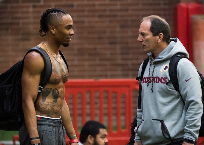 (Rick Egan  |  The Salt Lake Tribune)      Darren Carrington II, talks to a scout, after University of Utah's 2018 Pro Day for NFL scouts, at Spence Eccles Field House, Wednesday, March 28, 2018.