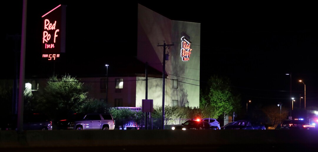 Officials work at the scene early Wednesday, March 21, 2018, in the Austin suburb of Round Rock, Texas, where according to authorities the suspect in a spate of bombing attacks that have terrorized Austin over the past month blew himself up with an explosive device as authorities closed in. (AP Photo/Eric Gay)