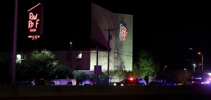 Officials work at the scene early Wednesday, March 21, 2018, in the Austin suburb of Round Rock, Texas, where according to authorities the suspect in a spate of bombing attacks that have terrorized Austin over the past month blew himself up with an explosive device as authorities closed in. (AP Photo/Eric Gay)