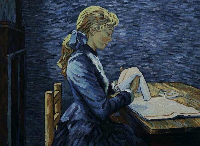 (Courtesy Good Deed Entertainment) Innkeeper Adeline Ravoux (performed by Eleanor Tomlinson) folds napkins and talks of encountering Vincent Van Gogh, in a scene from the animated drama "Loving Vincent," inspired by the paintings of Vincent Van Gogh.