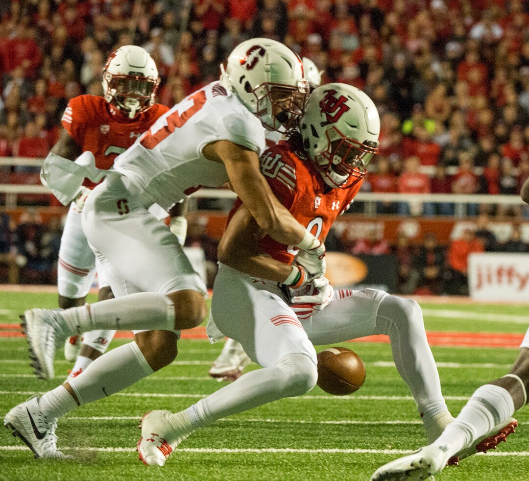 (Rick Egan  |  The Salt Lake Tribune)  Stanford Cardinal cornerback Alijah Holder (13) knocks the ball out of the hands of Utah Utes wide receiver Darren Carrington in PAC-12 football action, at Rice-Eccles Stadium, Saturday, October 7, 2017.