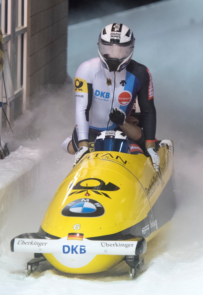 (Rick Egan  |  The Salt Lake Tribune)   The German 4-Man Bobsleigh team, Friedrich Francesco, Jannis Baecker, Martin Grothkopp, and Thorsten Margis, finishes in first place in the BMW IBSF World Cup 4-Man Bobsleigh competition, in Park City, Saturday, November 18, 2017.
