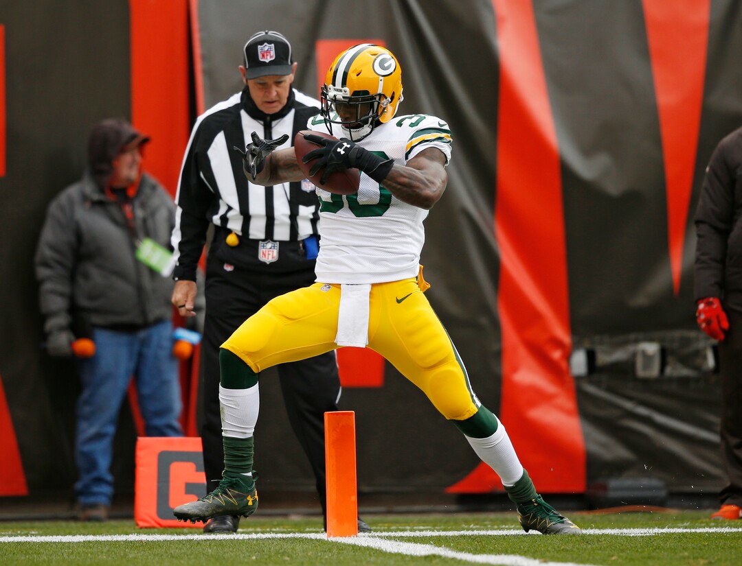 Green Bay Packers running back Jamaal Williams scores on a 30-yard touchdown pass in the first half of an NFL football game against the Cleveland Browns, Sunday, Dec. 10, 2017, in Cleveland. (AP Photo/Ron Schwane)