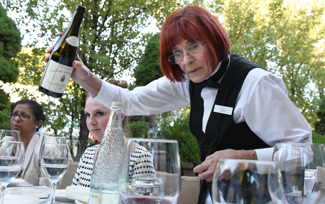 (Francisco Kjolseth  |  The Salt Lake Tribune)  Flo Blank, who has been a restaurant server for nearly 40 years, previously working in NYC, and at Salt Lake City's La Parisian and Al Forno's, works her regular shift at The Paris Restaurant at 15th and 15th in Salt Lake as she serves wine for patrons on the patio recently.