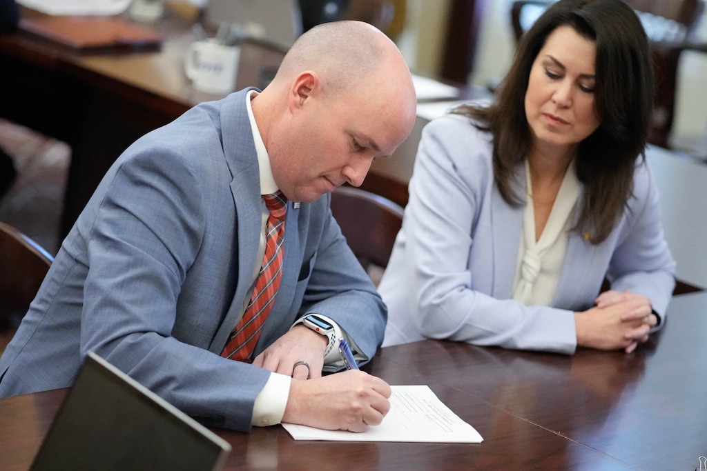 (Francisco Kjolseth  |  The Salt Lake Tribune) Gov. Spencer Cox alongside Lt. Gov. Deidre Henderson, files his paperwork to run for reelection on Wednesday, Jan. 3, 2024 at the Utah State Capitol.