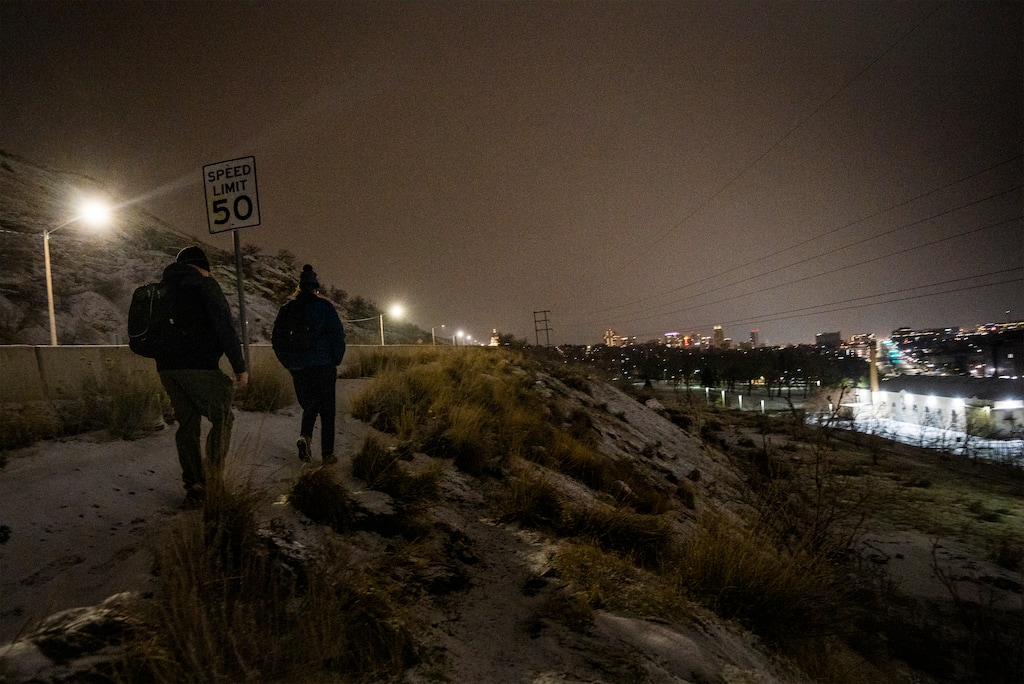 (Rick Egan | The Salt Lake Tribune) David Witt and Shawn Spalding look for unsheltered people along Victory Road during the Salt Lake County point-in-time count on Friday, Jan. 27, 2023. The count serves as an annual census of unsheltered people in the area.