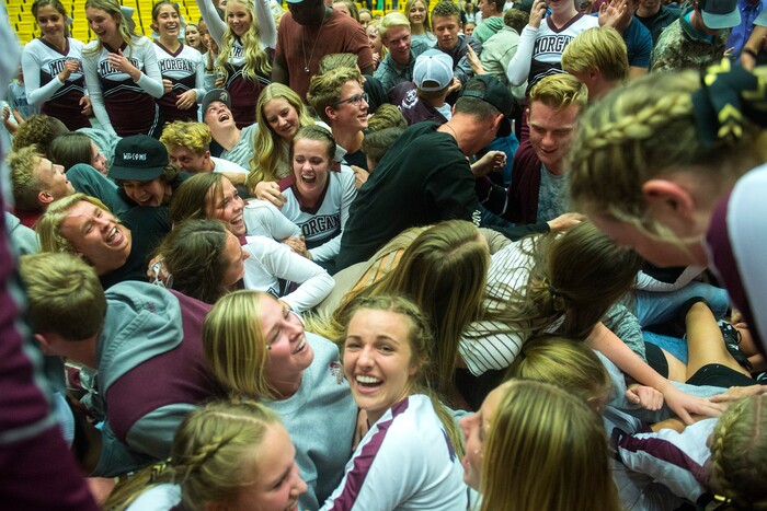 (Chris Detrick  |  The Salt Lake Tribune)  Morgan students rush the court as the Morgan Trojans celebrate winning the 3A volleyball state championships at the UCCU Center at Utah Valley University Thursday, October 26, 2017.  Morgan defeated North Sanpete 3-0.
