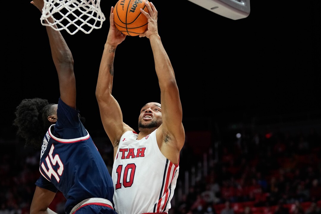 (Francisco Kjolseth | The Salt Lake Tribune) Arizona Wildcats guard Cedric Henderson Jr. (45) defends agains tUtah Utes guard Marco Anthony (10) as the University of Utah hosts the Arizona Wildcats in NCAA basketball in Salt Lake City on Thursday, Dec. 1, 2022.