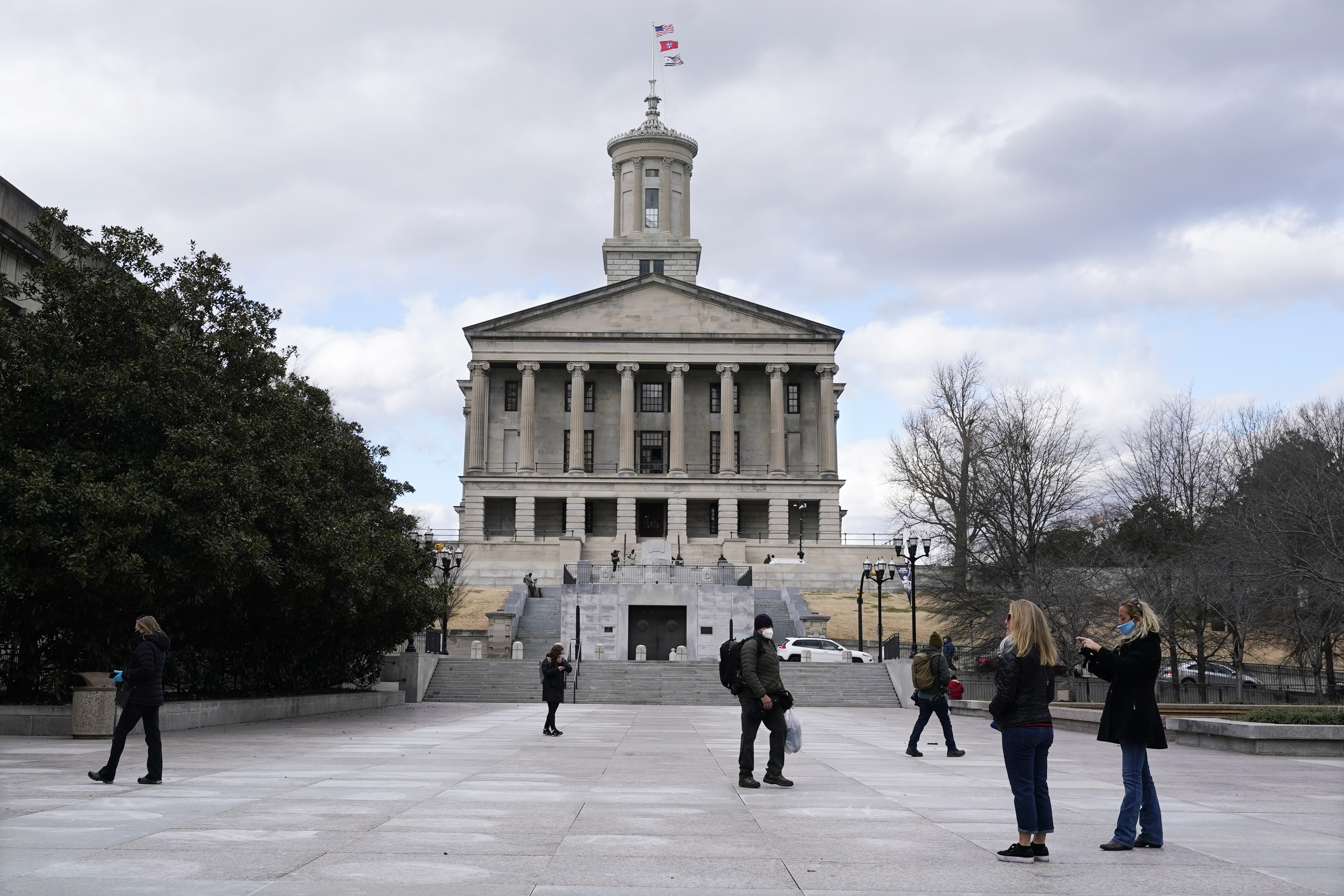 (Mark Humphrey | AP photo)

People walk across the quiet Legislative Plaza in front of the State Capitol Sunday, Jan. 17, 2021, in Nashville, Tenn.