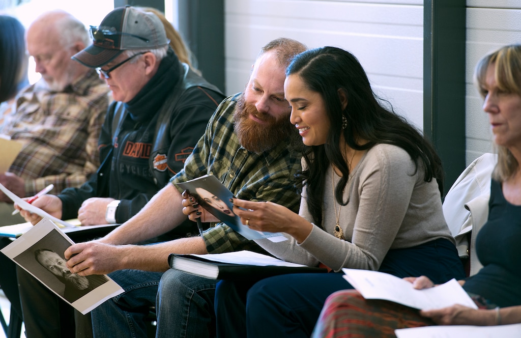 (Leah Hogsten  |  The Salt Lake Tribune) Josh Markham and Yenis Roberts share a laugh during Saturday's casting call at Salt Lake Community College, October 14, 2017 to play an extra for the upcoming series "Yellowstone," filmed in Utah staring Kevin Costner.