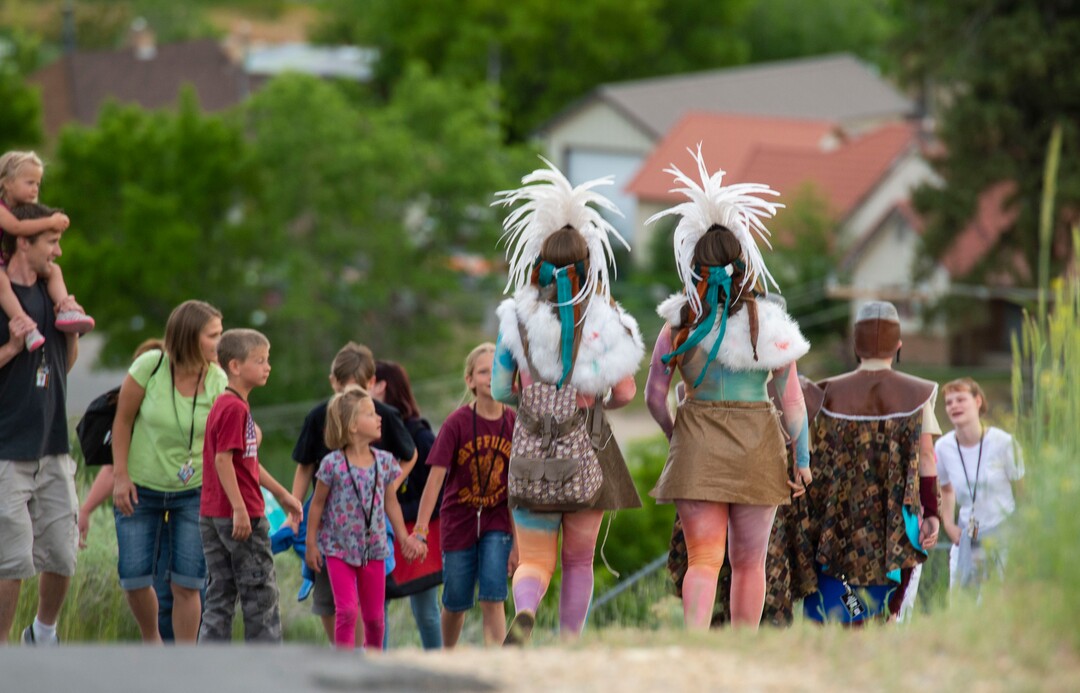 (Rick Egan  |  The Salt Lake Tribune)    Nephites, Lamanites and Pioneers walk down the hill to greet the crowd before the Mormon Miracle Pageant, Wednesday, June 12, 2019.  The final run for the pageant continues through Saturday, June 22.