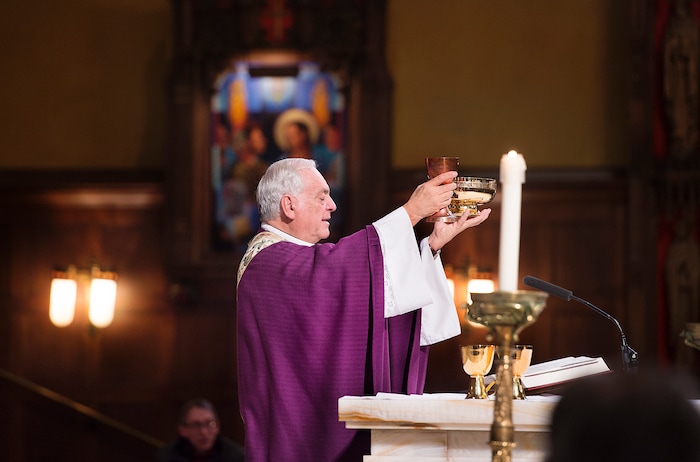 (Scott Sommerdorf   |  The Salt Lake Tribune)   The Reverend Martin Diaz, Rector and Pastor of The Cathedral of the Madeleine during the early morning Christmas Eve mass on the fourth Sunday of Advent at the Cathedral of the Madeleine, Sunday, December 24, 2017. 