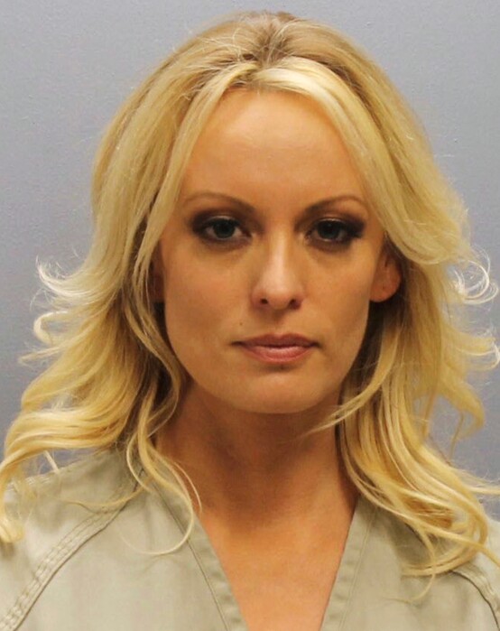 (Franklin County Sheriff's Office | The Associated Press) This photo provided by the Franklin County Sheriff's Office on Thursday, July 12, 2018, shows porn actress Stormy Daniels.  Daniels was arrested at a Columbus, Ohio strip club and is accused of letting patrons touch her in violation of a state law, her attorney said early Thursday.