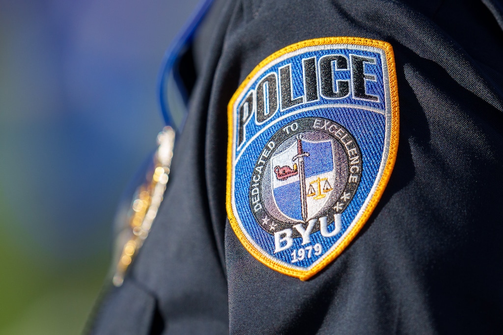 (Trent Nelson | The Salt Lake Tribune) A Brigham Young University police officer on the sideline at a football game in Provo on Saturday, Oct. 21, 2023.