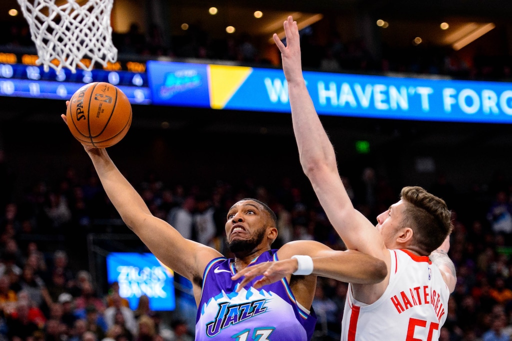 (Trent Nelson  |  The Salt Lake Tribune) Utah Jazz center Tony Bradley (13) scores ahead of Houston Rockets center Isaiah Hartenstein (55) as the Utah Jazz host the Houston Rockets, NBA basketball in Salt Lake City on Monday, Jan. 27, 2020.