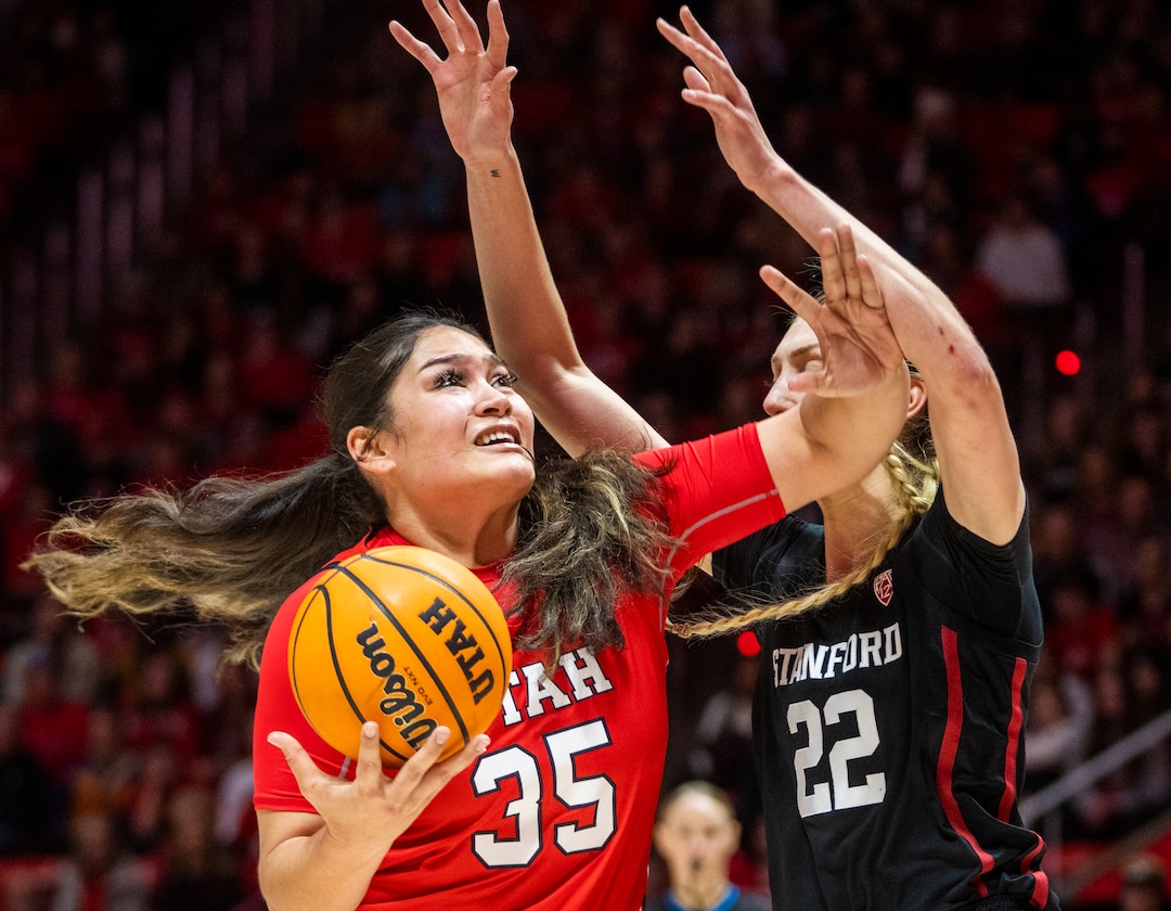 (Rick Egan | The Salt Lake Tribune) Utah Utes forward Alissa Pili (35) takes the ball to the hoop, as Stanford Cardinal forward Cameron Brink (22)denfeds, in PAC-12 action between the Utah Utes and the Stanford Cardinals, at the Jon M. Huntsman Center, on Saturday, Feb. 25, 2023.