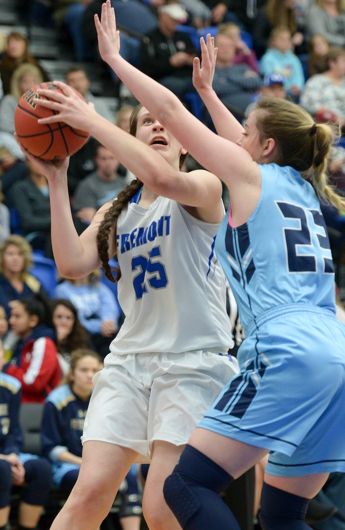 (Leah Hogsten  |  The Salt Lake Tribune)  Fremont's Emma Calvert (25) drives around Westlake's Tatum Peterson (23). Fremont faces Westlake in their semifinal game of the 6A High School Girls' Basketball Tournament at SLCC in Taylorsville, Friday, Feb. 23, 2018. 