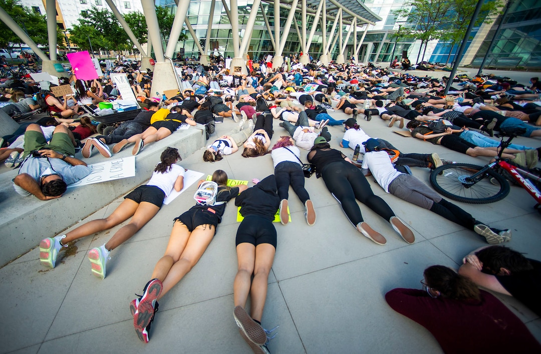 (Rick Egan  |  The Salt Lake Tribune) Protestors lie down for 9 minutes in memory of George Floyd during a demonstration at the Public Safety Building, Wednesday, June 3, 2020.