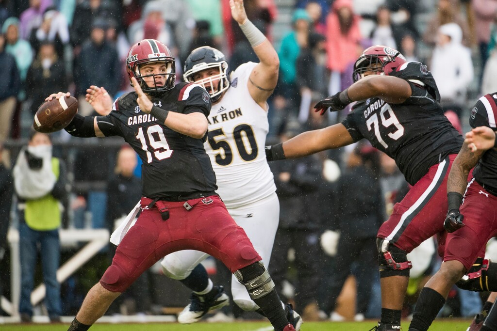 (AP Photo/Sean Rayford) South Carolina quarterback Jake Bentley (19) , shown throwing a pass against Akron in 2018, is coming to Utah as a graduate transfer, he announced Monday.
