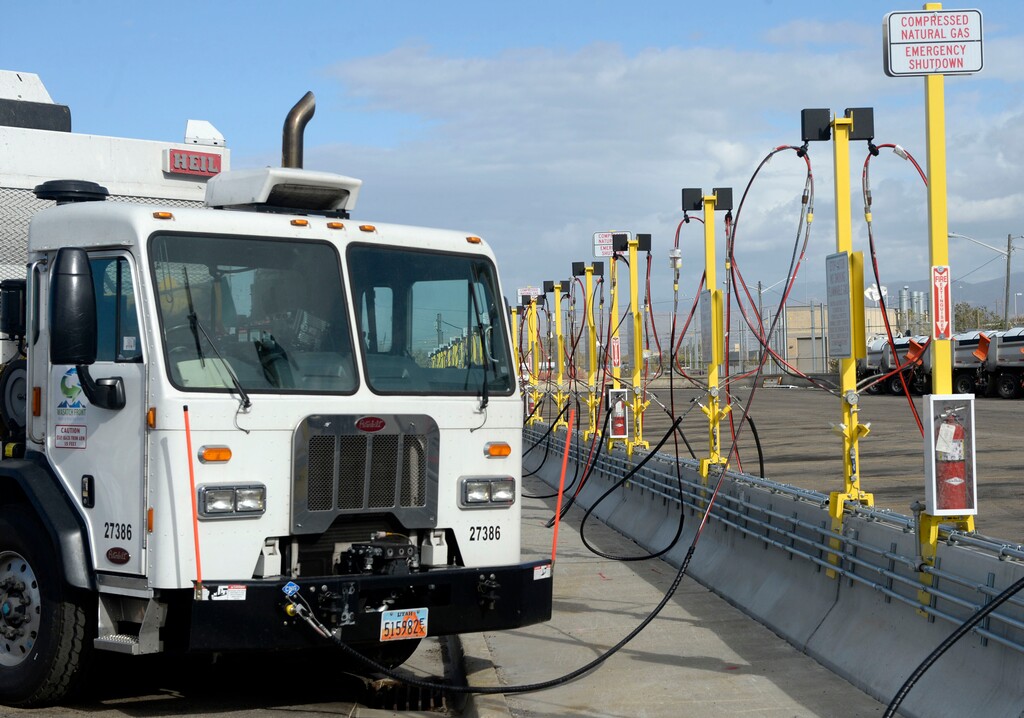 Al Hartmann | The Salt Lake Tribune
Sanitation truck fills up at Salt Lake County Fleet Management's new CNG (compressed natural gas) filling station Tuesday, Nov. 3. The new CNG filling stations will service its large fleet of trucks that are switching from diesel to the cleaner, cheaper charged natural gas. The change to this fuel is expected to reduce the fleet's contribution to air pollution in the Salt Lake Valley — just as residents brace for on the onset of inversion season.