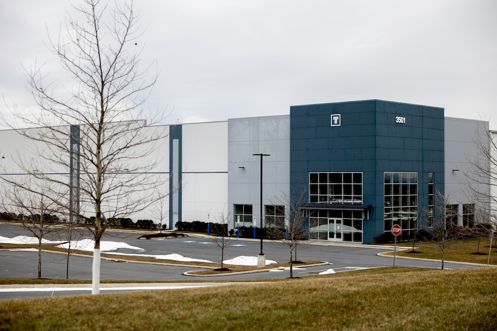 (Rachel Wisniewski | The New York Times) A warehouse that Immigration and Customs Enforcement recently purchased for $87 million in Hamburg, Pa., Feb. 26, 2026. Immigration and Customs Enforcement plans to sell or give away most of the 11 warehouses it bought to detain migrants, reversing course on a signature initiative.