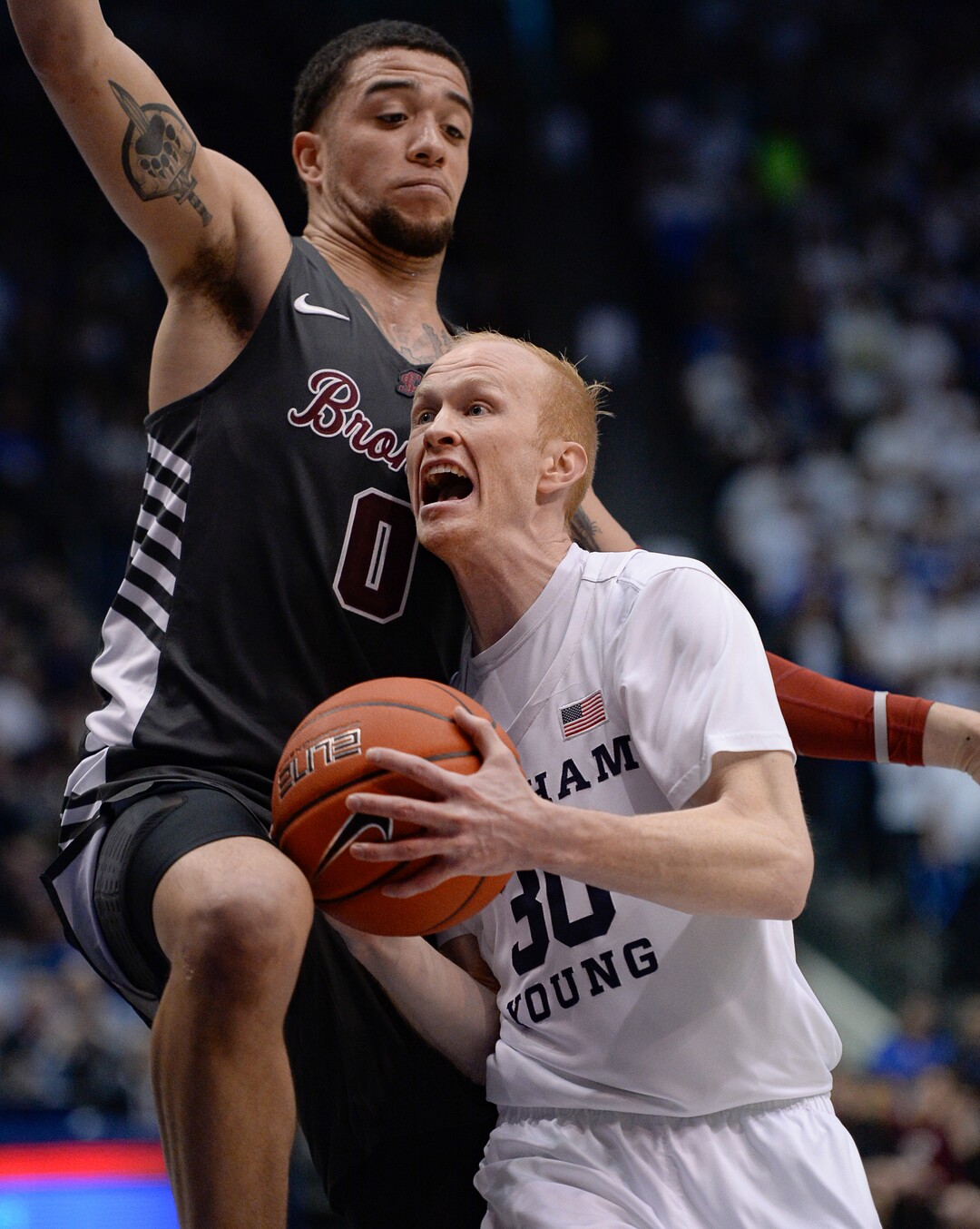 (Francisco Kjolseth  |  The Salt Lake Tribune) Santa Clara Broncos forward DJ Mitchell (0) tries to slow Brigham Young Cougars guard TJ Haws (30) in the second half as the Brigham Young Cougars host the Santa Clara Broncos at the Marriott Center in Provo, Thursday, Feb. 20, 2020. BYU won 85-75.