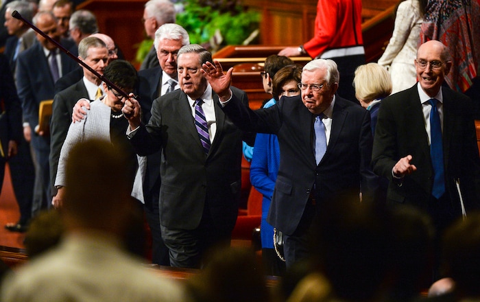  (Chris Samuels | The Salt Lake Tribune) From left, Jeffrey R. Holland, M. Russell Ballard and Henry B. Eyring wave to attendees after a session of General Conference of The Church of Jesus Christ of Latter-day Saints in Salt Lake City, Sunday, April 3, 2022.