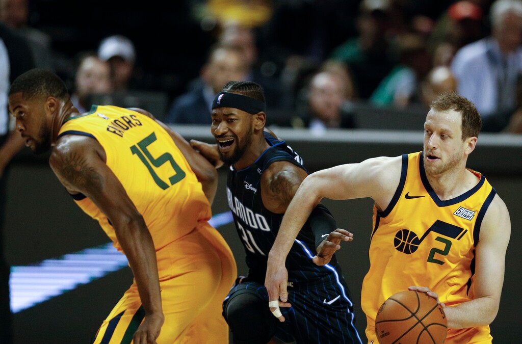 (AP Photo/Rebecca Blackwell) | The Joe Ingles (2) and Derrick Favors (15) pick and roll game is returning to Salt Lake City for an encore performance, after the Utah Jazz re-signed Favors on Friday at the start of free agency. Putting the duo back together on the floor should translate into an upgrade for the Jazz bench this coming season.