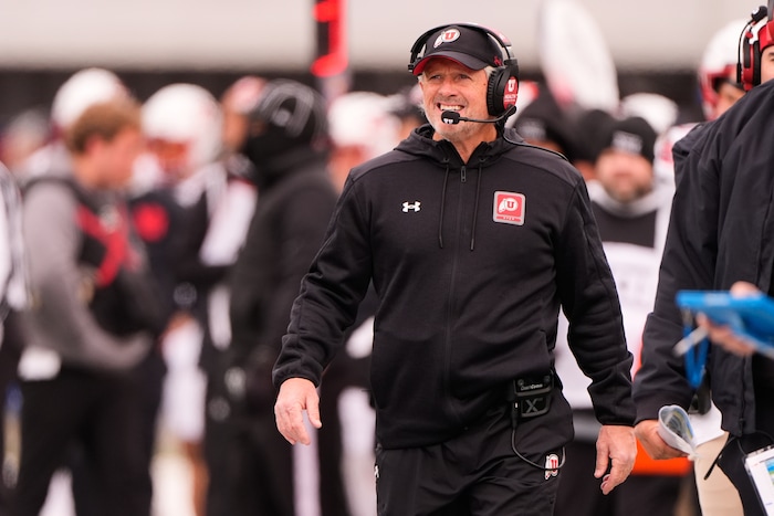 (Charlie Riedel | AP) Utah head coach Kyle Whittingham watches during the first half of his team's game against Kansas on Friday, Nov. 28, 2025, in Lawrence, Kan.