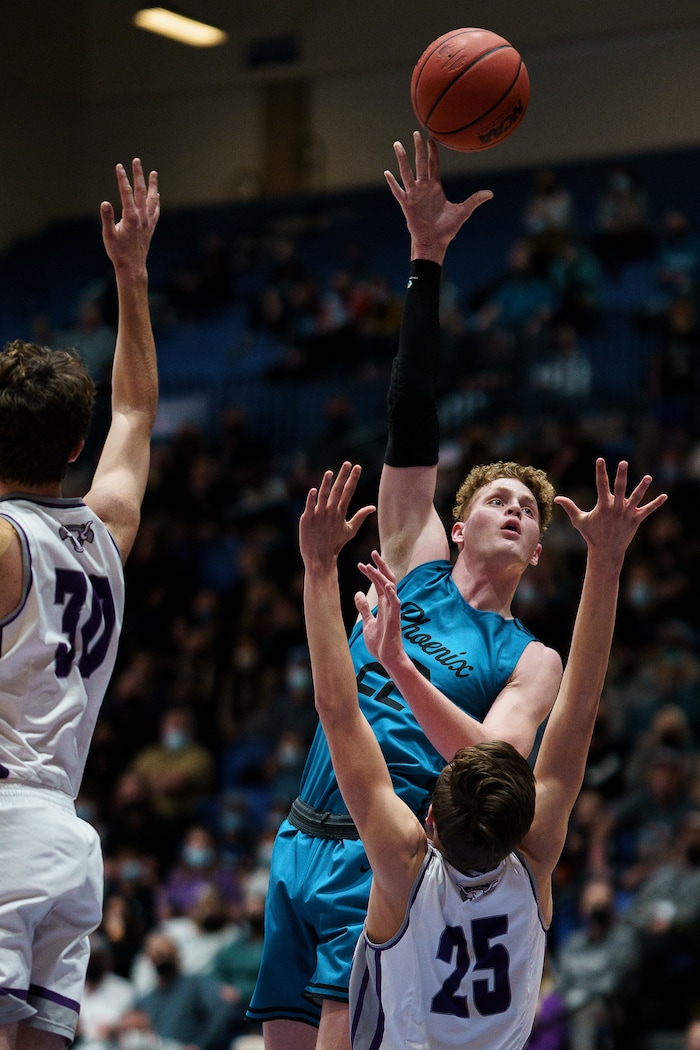 (Trent Nelson | The Salt Lake Tribune) Farmington's Truman Hendry shoots the ball as Lehi faces Farmington High School in the 5A boys basketball state championship game, in Taylorsville on Saturday, March 6, 2021.