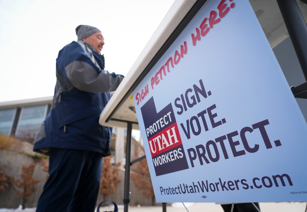 (Bethany Baker | The Salt Lake Tribune) Union workers host a signature gathering event to put a referendum on the 2026 ballot to rescind HB267, a law that affects the ability of public workers to organize, at University of Utah in Salt Lake City on Friday, March 21, 2025.