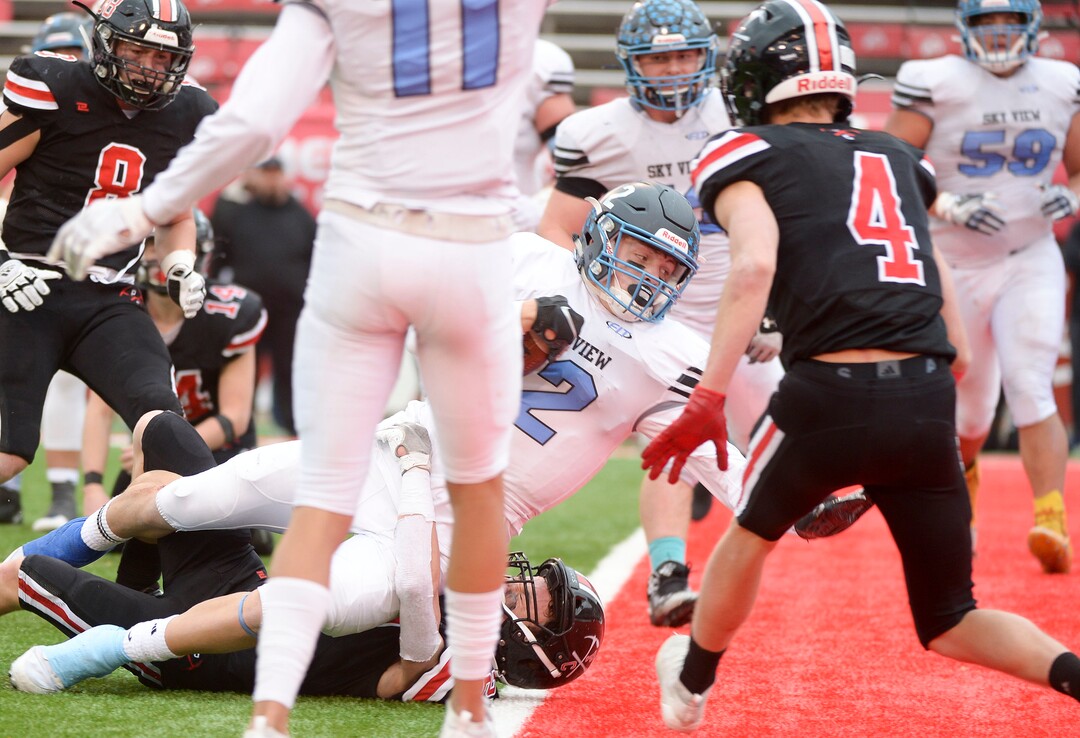 (Leah Hogsten  |  The Salt Lake Tribune) Sky ViewÕs quarterback Kason Carlsen wit the touchdown. Sky View High School defeated Park City 35-0 to win the 4A State Championship football title, Nov. 11, 2019 at Rice-Eccles Stadium.