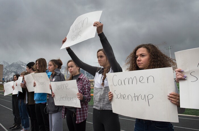 Scott Sommerdorf | The Salt Lake Tribune
Tailyn Bradford holds up a sign with the name Aaron Fels, one of the names of the 17 students and staff killed at Marjory Stoneman Douglas High School, during their walkout at Brighton High School, Wednesday, March 14, 2018.