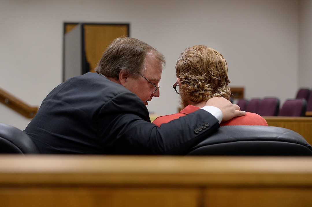 (Scott Sommerdorf   |  The Salt Lake Tribune)   Attorney Neil Skousen speaks with his client defendant Tyerell Joe Przybycien, 18, of Spanish Fork, during his preliminary hearing, Wednesday, August 23, 2017.  Przybycien is charged with first-degree felony murder for buying items used by a 16-year-old girl to hang herself on May 5 in Utah County.  Przybycien also recorded the girl's death, according to charges.