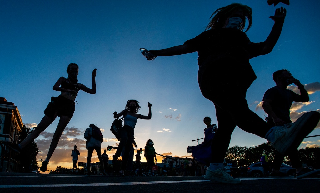 (Rick Egan  |  The Salt Lake Tribune)   Protesters dance in the street on West Temple, during a "Dance Rally For Change" protest, on Friday, July 3, 2020.